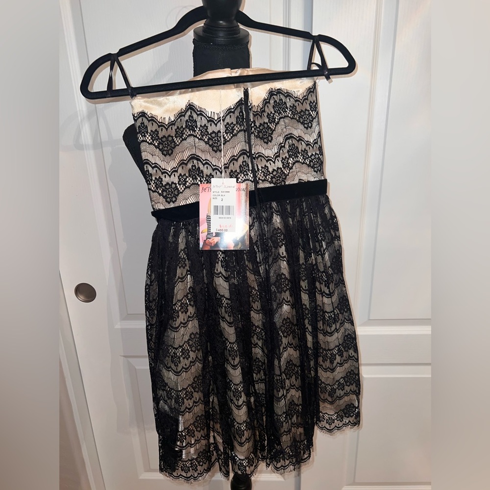 Betsey Johnson Lace black and cream color . Never worn Size 2